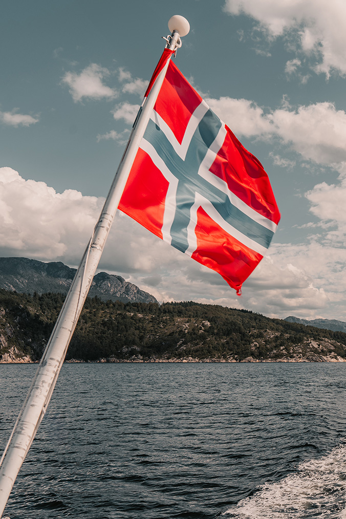 flag-of-norway-on-the-sea-lysefjord-norway-2024-11-27-17-13-25-utc